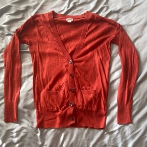 Small cardigan, no holes, slightly used.